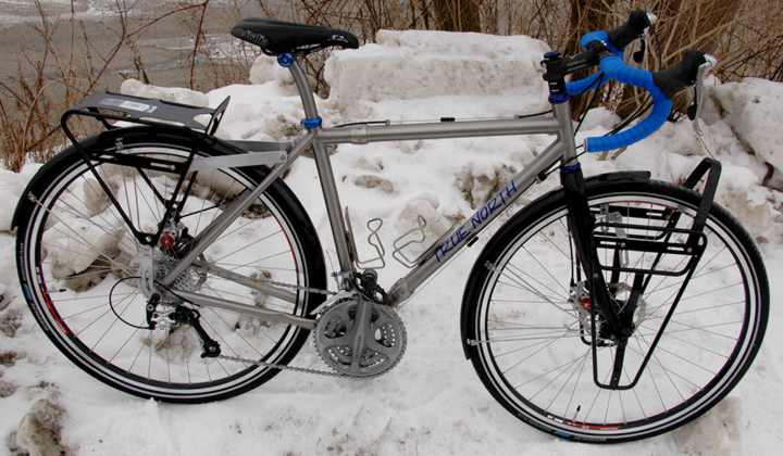 A Pair of True North Cycles Titanium touring bikes with S and S Couplings